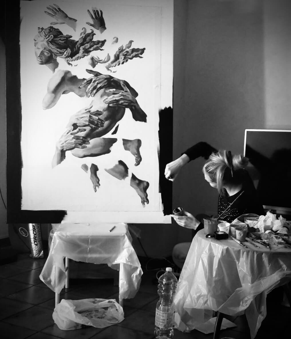 the artist is painting